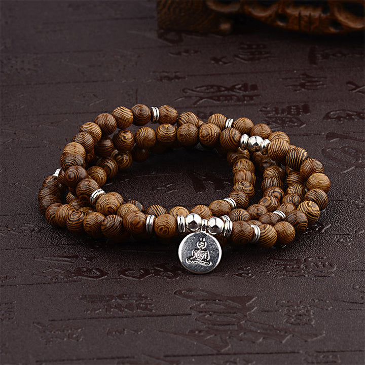 Bracelet tibétain en bois avec Buddha Stones et foudre