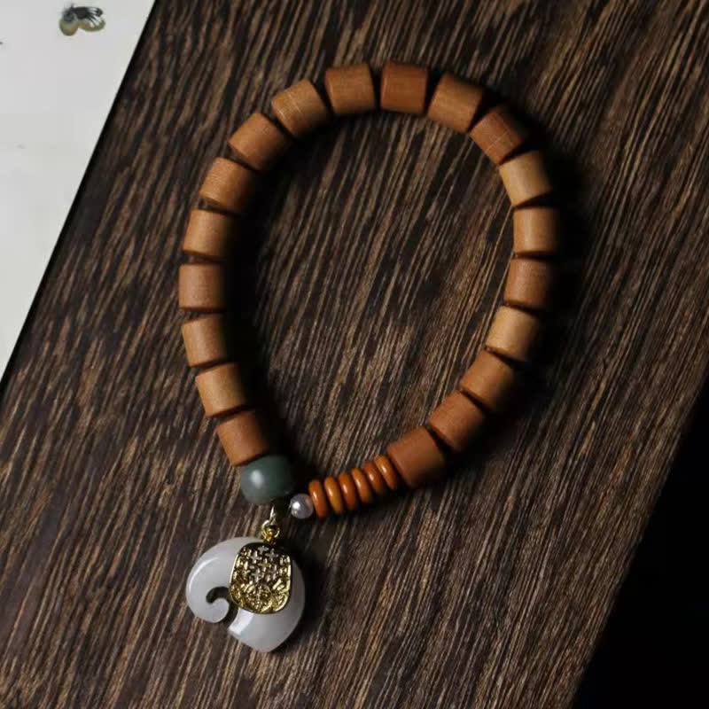 Bracelet de protection éléphant en jade et bois de santal