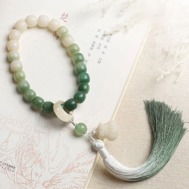 Buddha Stones Dégradé Naturel Graine de Bodhi Fortune Sac d'Argent Sagesse de Lotus Gland Poignet Mala
