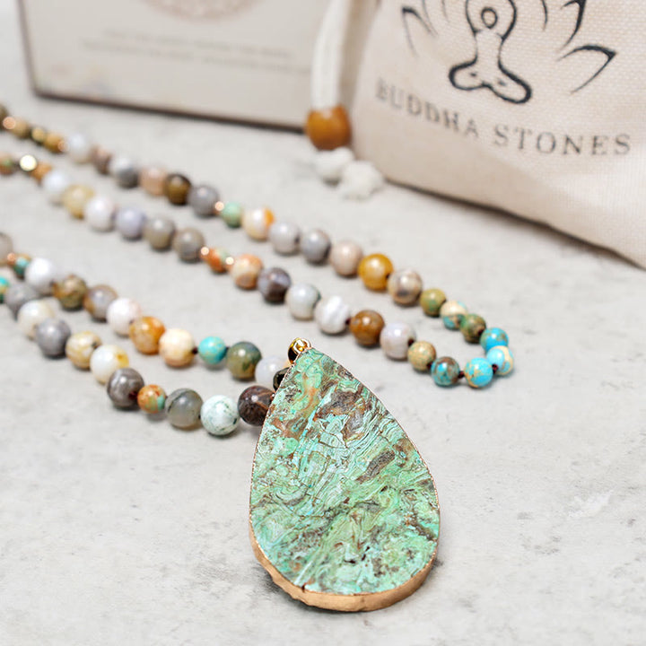 Collier de guérison en perles de jaspe Picasso naturel de l'océan Buddha Stones