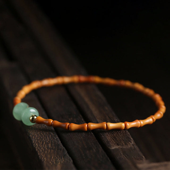 Bracelet porte-bonheur en aventurine verte naturelle avec noyau d'olive et pierres de Buddha Stones