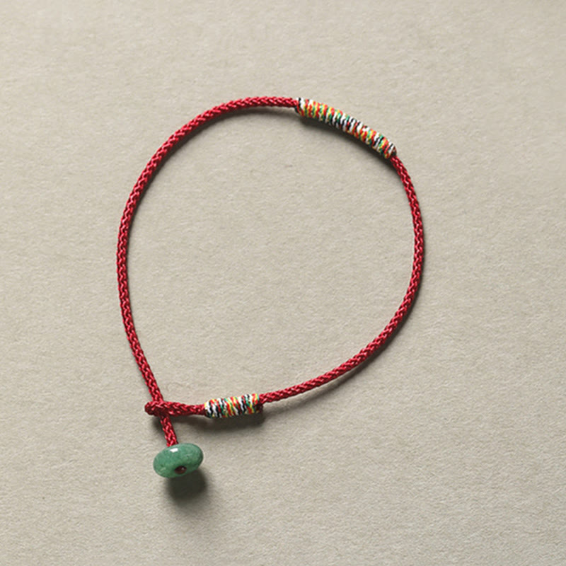 Bracelet en corde tressée tibétain fait main en aventurine verte avec Buddha Stones et protection de la chance