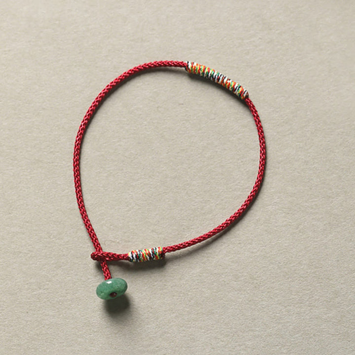 Bracelet en corde tressée tibétain fait main en aventurine verte avec Buddha Stones et protection de la chance