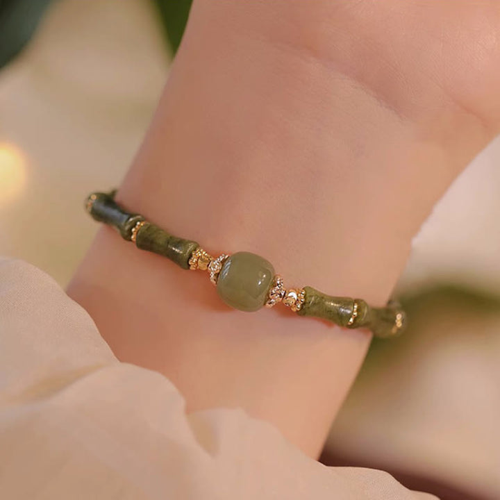 Bracelet porte-bonheur en jade Hetian péridot plaqué cuivre 14 carats avec Buddha Stones et motif bambou