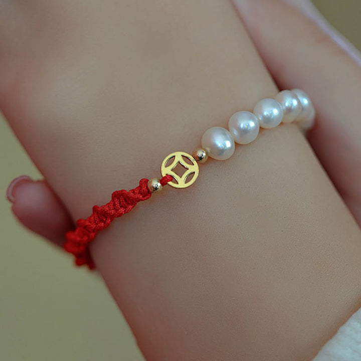 Bracelet tressé en fil rouge avec perles de protection et de chance plaquées or 14 carats