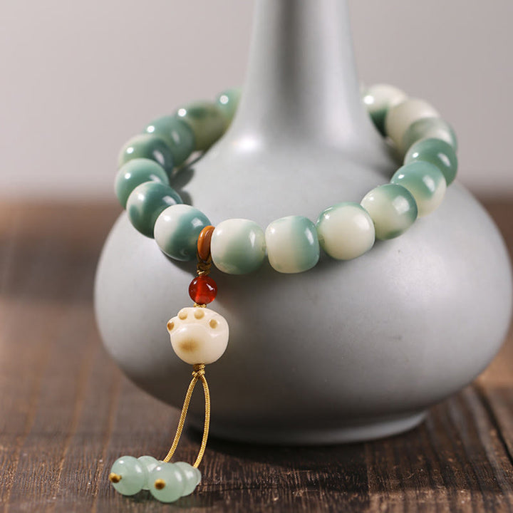 Bracelet de paix en forme de pomme de pin et de patte de chat, motif de Buddha Stones dégradées, graines de Bodhi, renard à neuf queues - Patte de chat blanche (circonférence du poignet 16-17 cm) - image 15