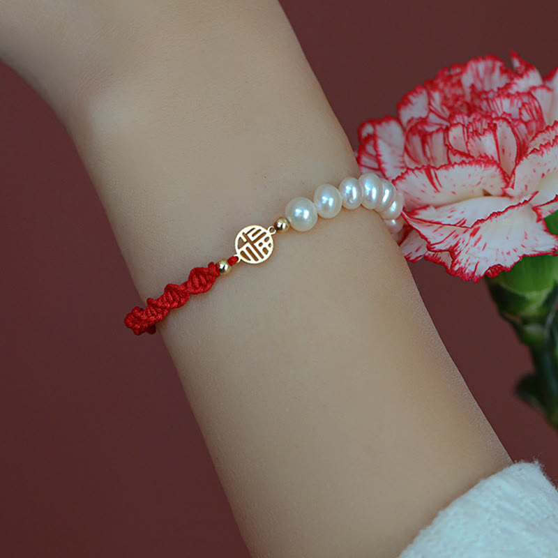 Bracelet tressé en fil rouge avec perles de protection et de chance plaquées or 14 carats