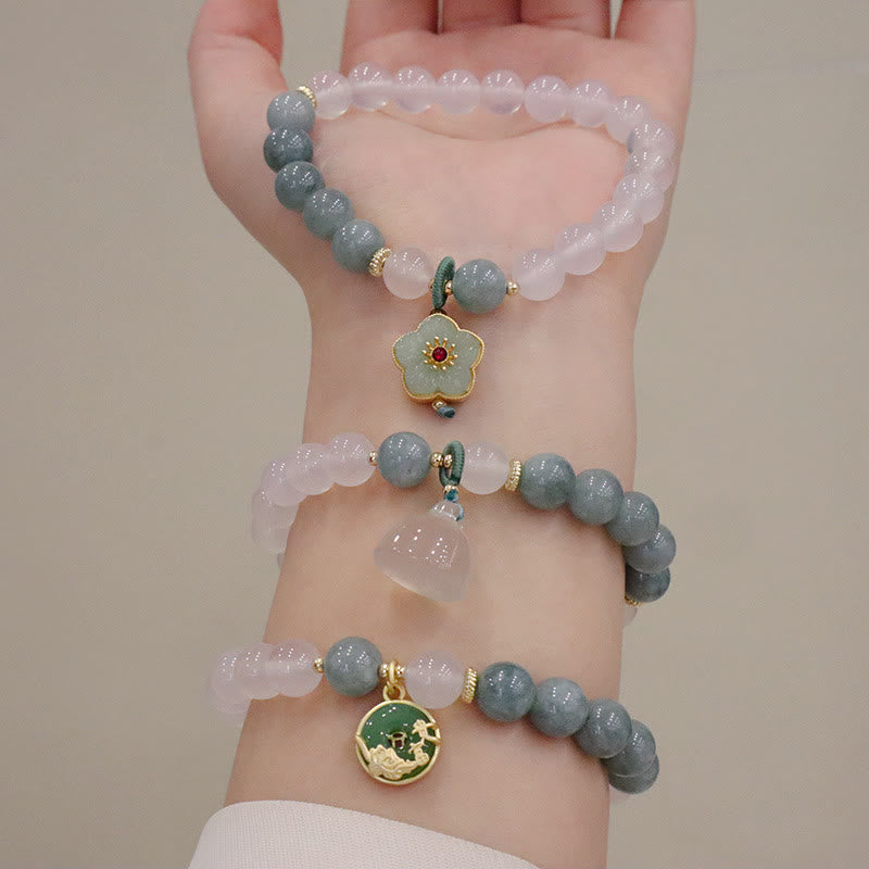 Bracelet de protection avec boucle de paix en Buddha Stones et jade blanc et fleur de lotus