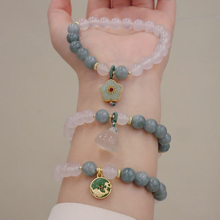 Bracelet de protection avec boucle de paix en Buddha Stones et jade blanc et fleur de lotus