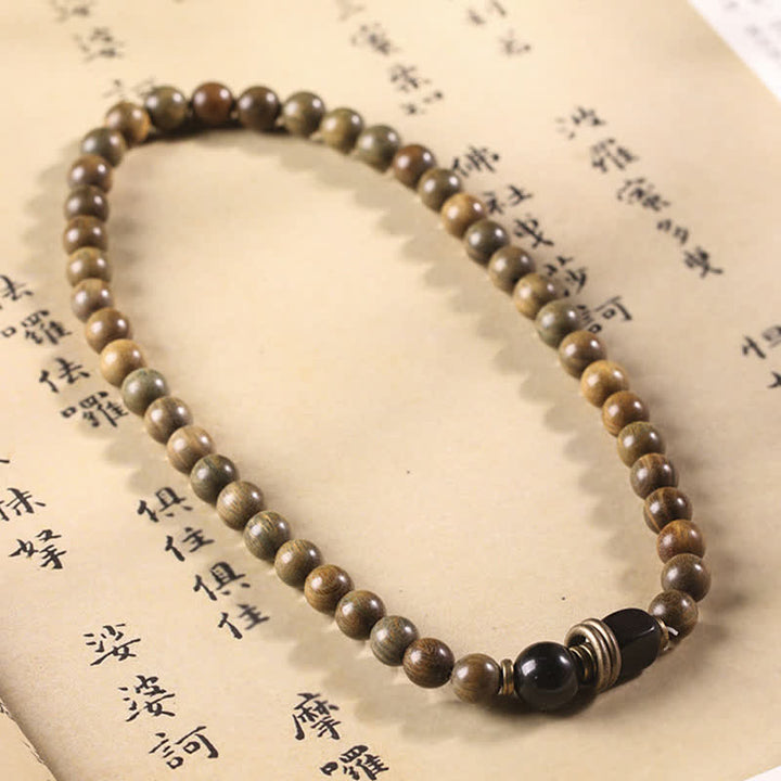 Bracelet tibétain apaisant en cristal de bois de santal vert