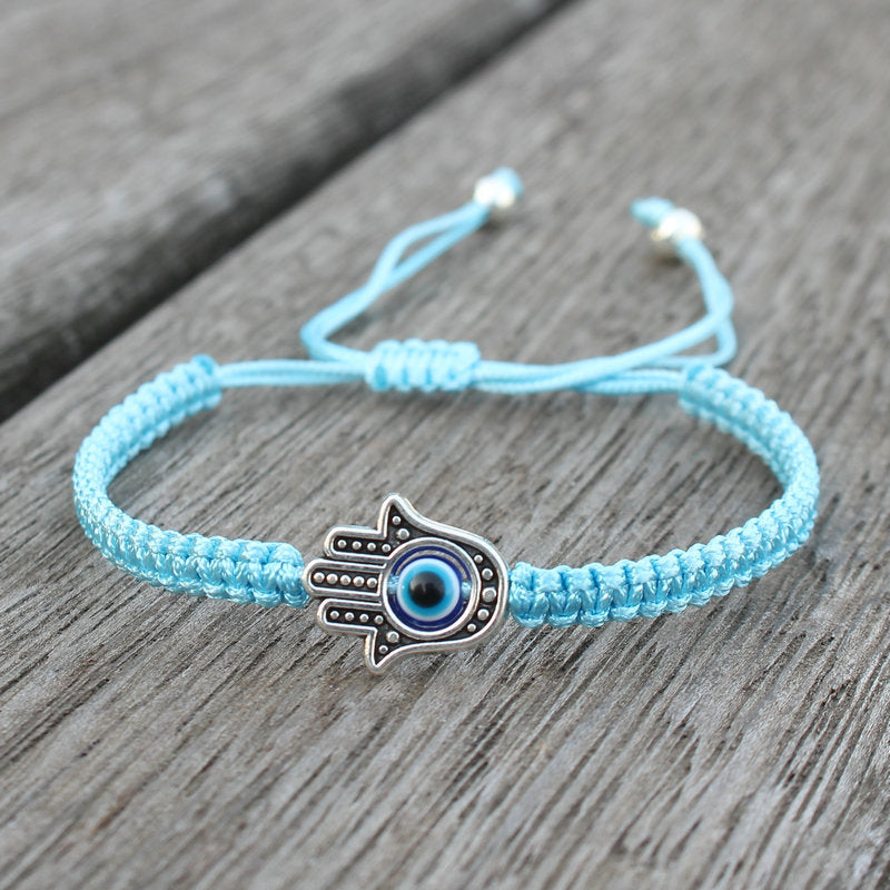 Bracelet en corde fait main avec symbole Hamsa et Buddha Stones