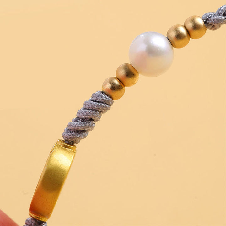 Bracelet tressé en corde bleue avec perles et arbre de fortune en cuivre et Buddha Stones