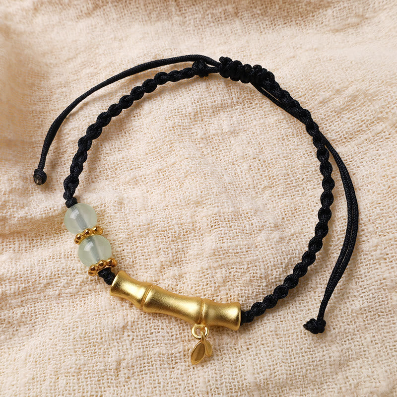 Bracelet tressé en bambou Buddha Stones et motif porte-bonheur