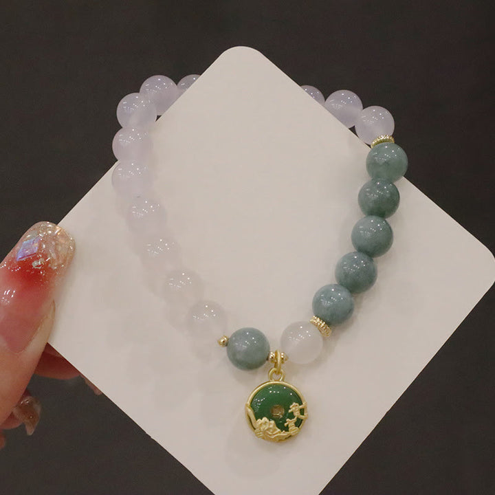 Bracelet de protection avec boucle de paix en Buddha Stones et jade blanc et fleur de lotus