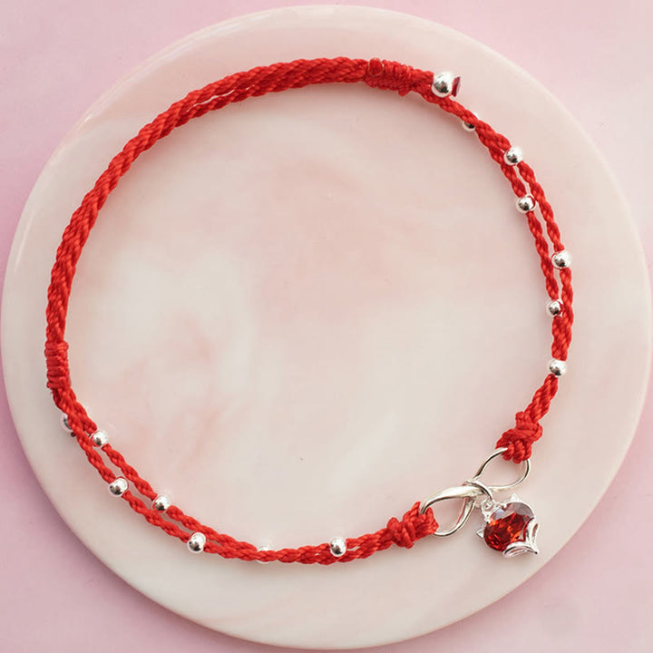 Bracelet de cheville tressé avec symbole de l'infini et du cœur en Buddha Stones