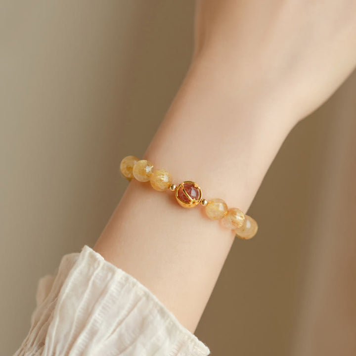 Bracelet de protection étoile en quartz rutile doré et quartz fraise Buddha Stones