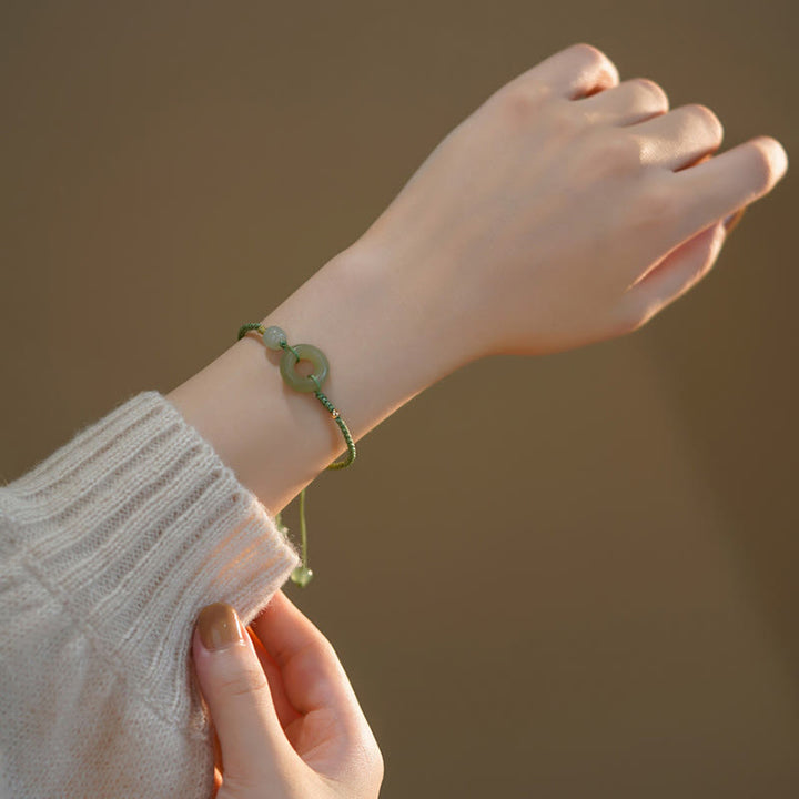 Bracelet en corde avec perles porte-bonheur et breloque en jade et Buddha Stones