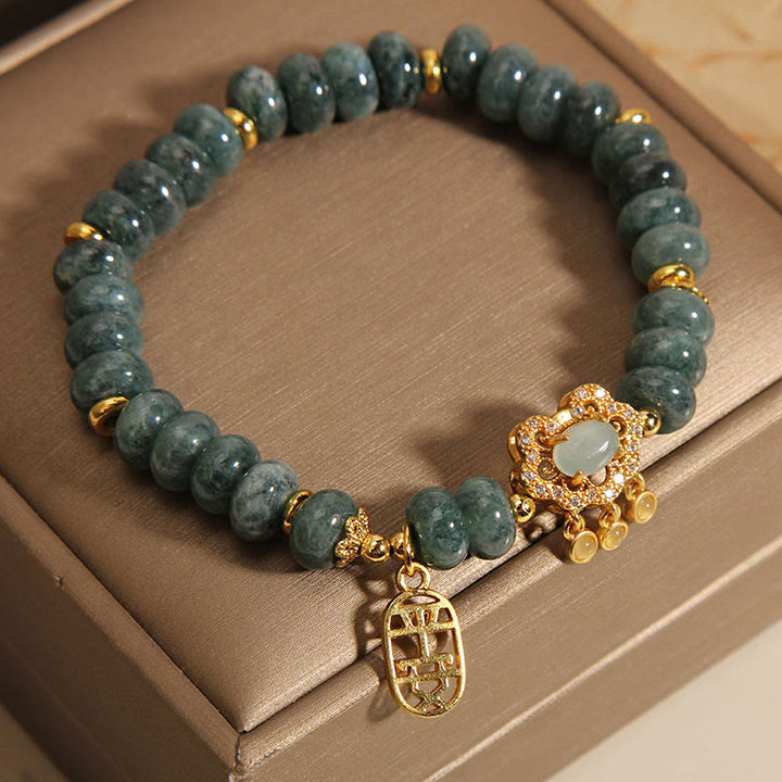 Bracelet en Buddha Stones en jade naturel avec breloque en forme de cadenas chinois, paix, chance et abondance
