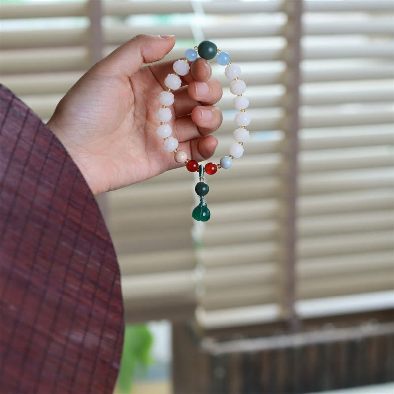 Bracelet de paix et d'harmonie sculpté en perles de lotus et graines de Bodhi en Buddha Stones