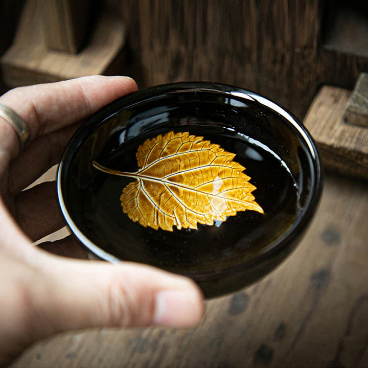 Tasse à thé en céramique chinoise Jianzhan avec feuilles d'érable dorées et Buddha Stones