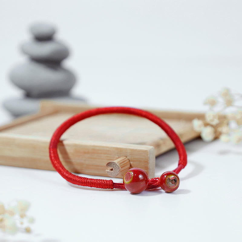 Bracelet en céramique rouge porte-bonheur Feng Shui Buddha Stones et fil rouge - image 2