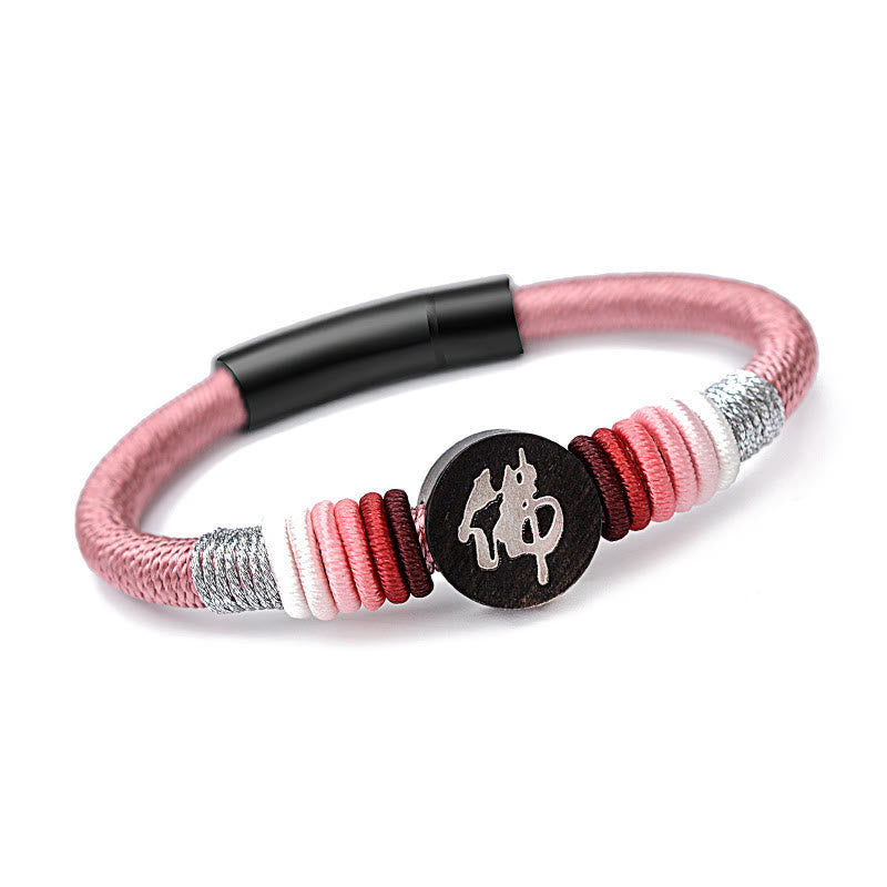 Bracelet en corde fait main en ébène avec personnage de Bouddha de Buddha Stones