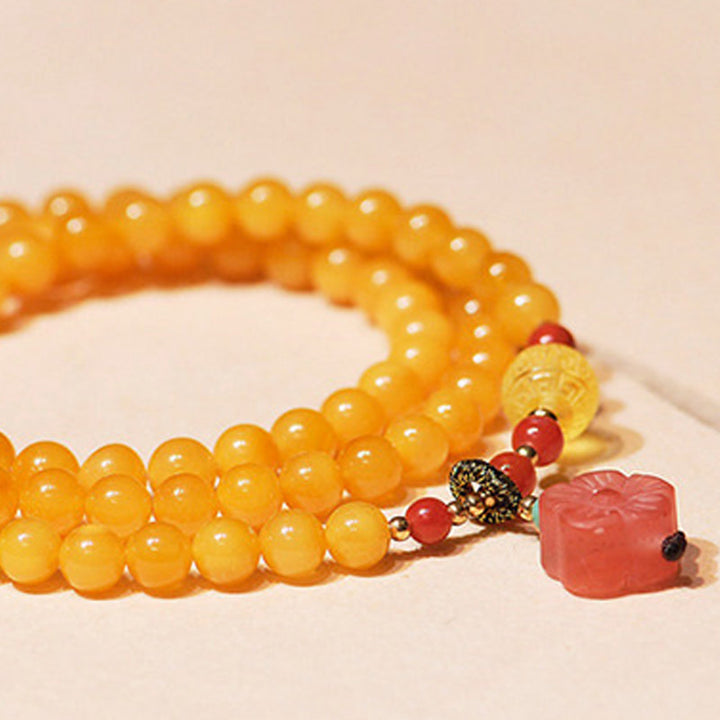 Collier d'équilibre et de guérison en ambre, bracelet à breloques en forme de fleur