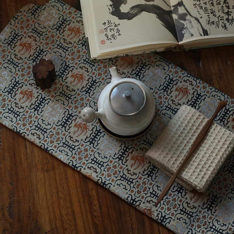 Dessous de verre élégant à motif de brocart floral pour tasse à thé