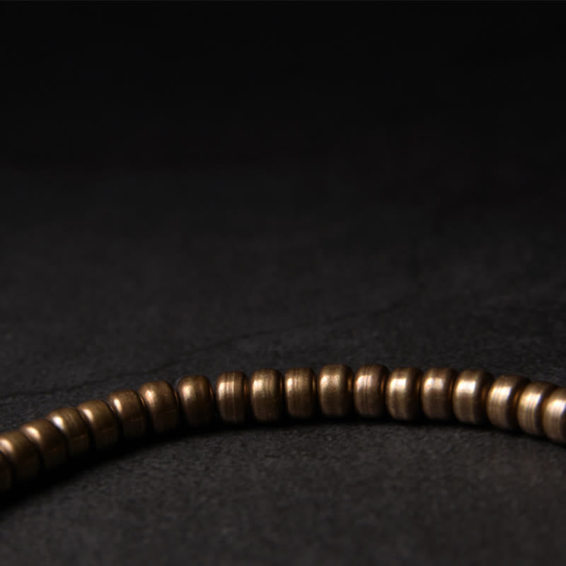 Bracelet porte-bonheur en perles de cuivre et de laiton au design simple Buddha Stones