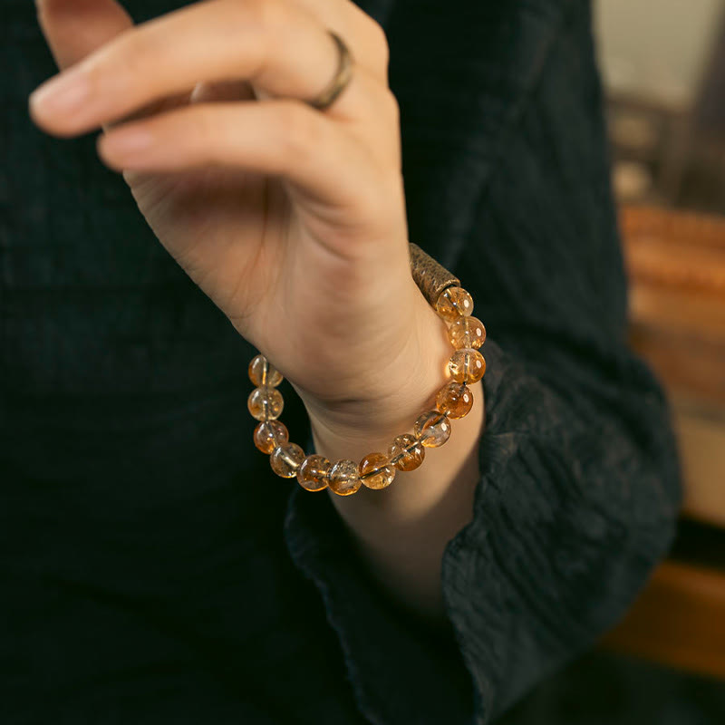Bracelet de protection en perles de cristal de citrine naturelle et de laiton Buddha Stones