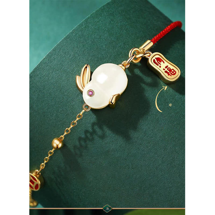 Bracelet en chaîne rouge en jade blanc et pierres de Buddha Stones Année du lapin
