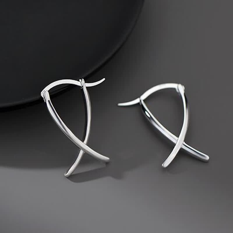 Boucles d'oreilles créoles porte-bonheur à motif géométrique croisé