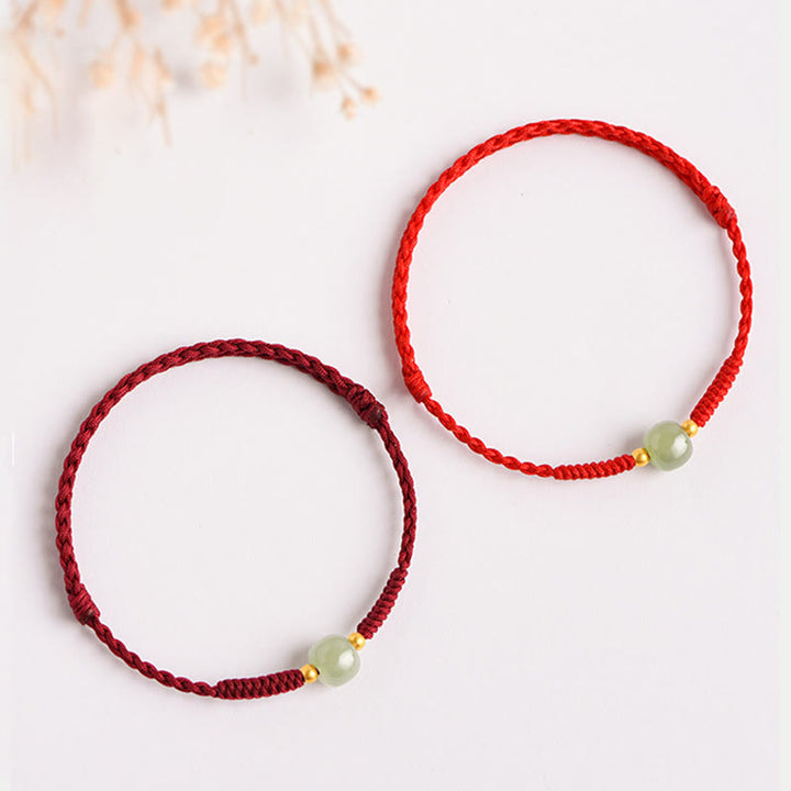 Bracelet tressé en perles de jade porte-bonheur et prospérité fait main avec Buddha Stones
