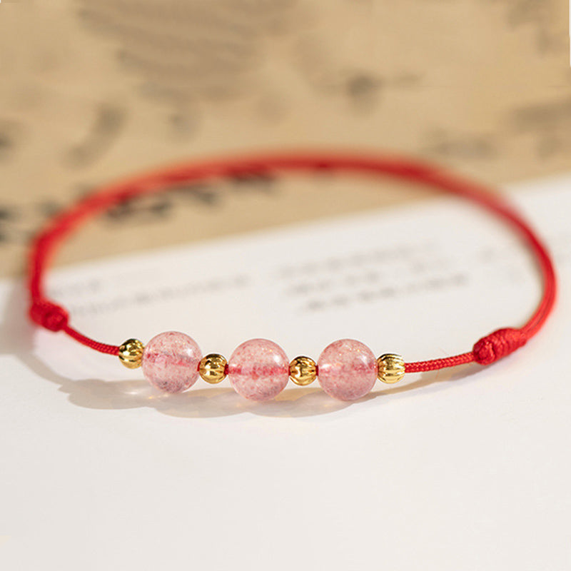 Bracelet de cheville en fil rouge avec perles en cristal de fraise et Buddha Stones