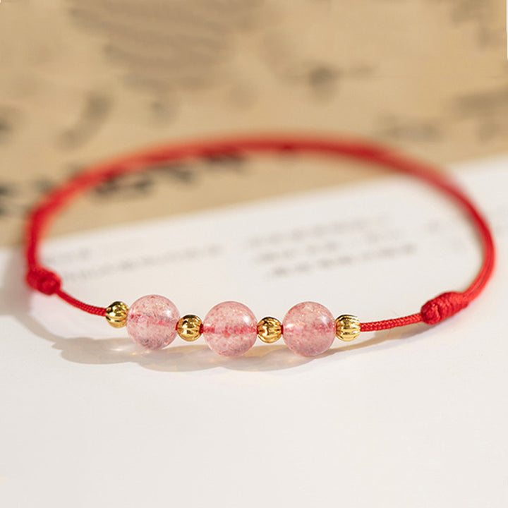 Bracelet de cheville en fil rouge avec perles en cristal de fraise et Buddha Stones