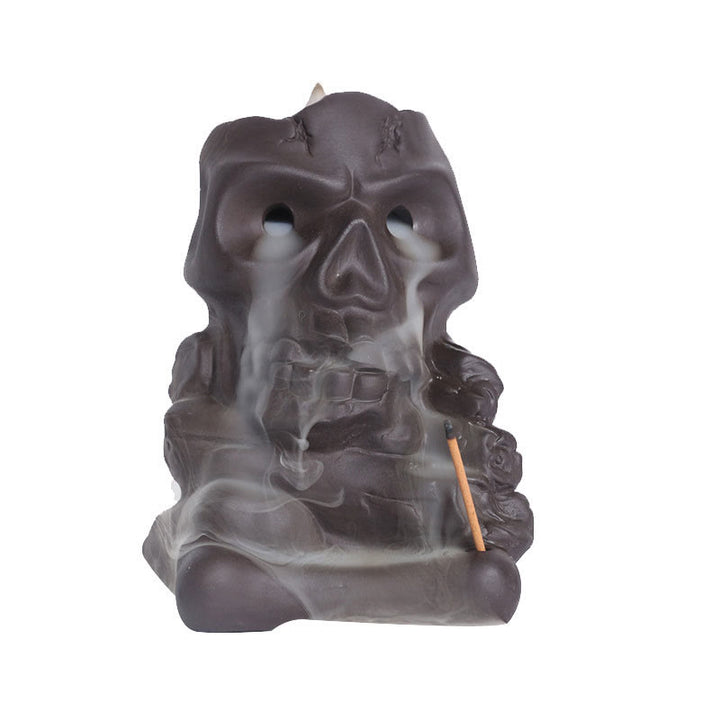 Brûleur d'encens de guérison en argile violette avec tête de mort en Buddha Stones pour Halloween