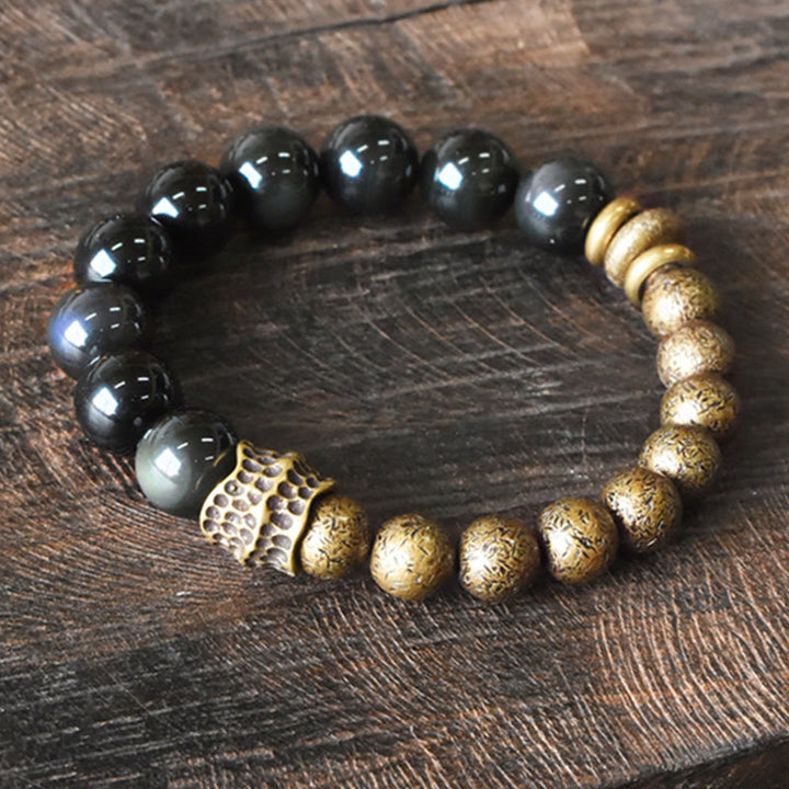 Bracelet de transformation positive en perles de cuivre et obsidienne arc-en Buddha Stones