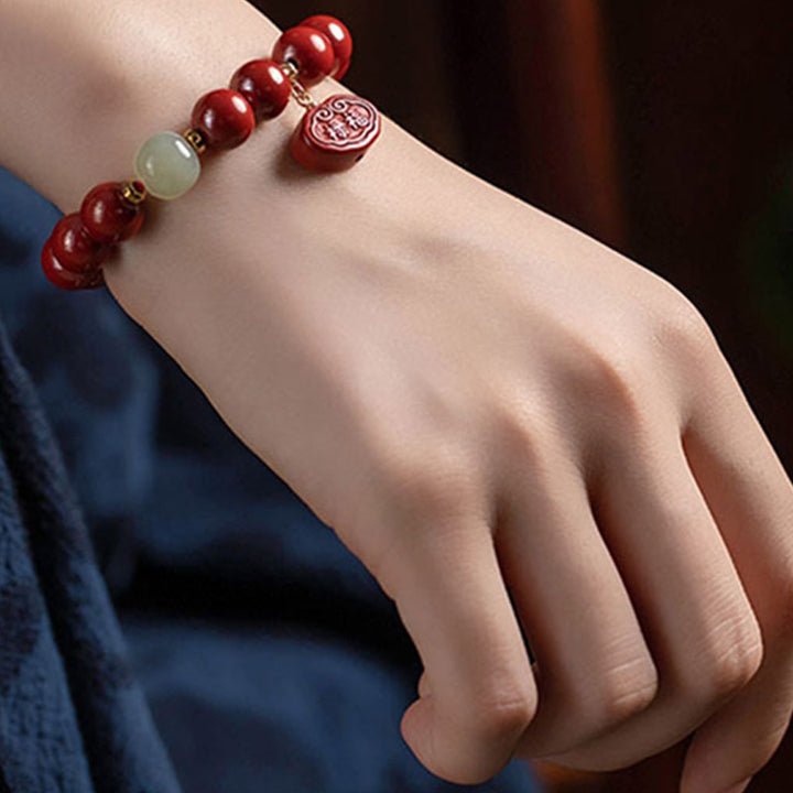 Bracelet de protection et de guérison en jade cinabre et Buddha Stones