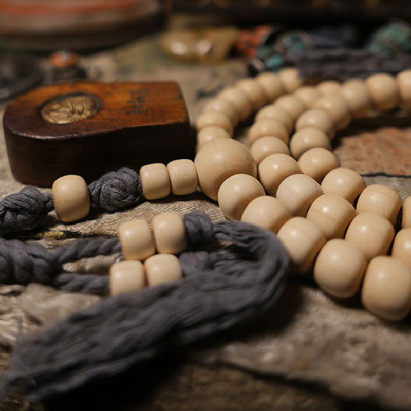Mala en bois d'Abelia Biflora avec 108 Buddha Stones pour éloigner les mauvais esprits