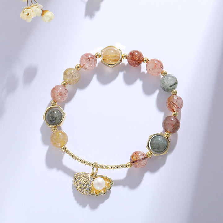 Bracelet de perles de protection en coquillage de quartz rutile coloré naturel de Buddha Stones