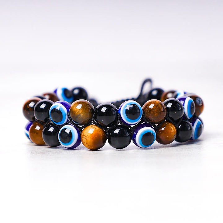 Bracelet de perles de protection contre le mauvais œil en hématite et œil de tigre Buddha Stones