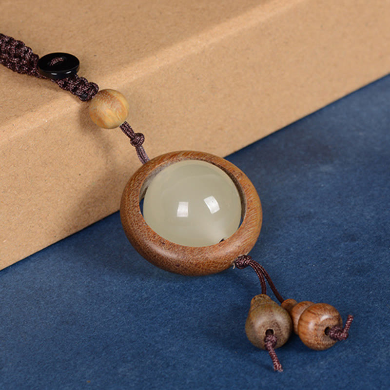 Porte-clés porte-bonheur lumineux en Buddha Stones en bois de santal rouge et bois d'ébène en bois de santal vert