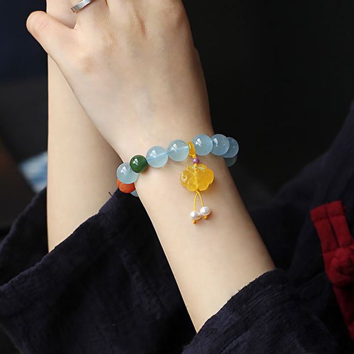 Bracelet de paix avec breloque en ambre et aigue-marine naturelle