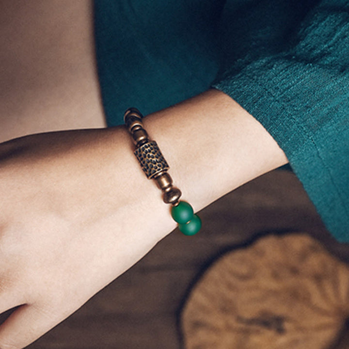 Bracelet tibétain en agate rouge et agate verte en cuivre pour la confiance et la fortune
