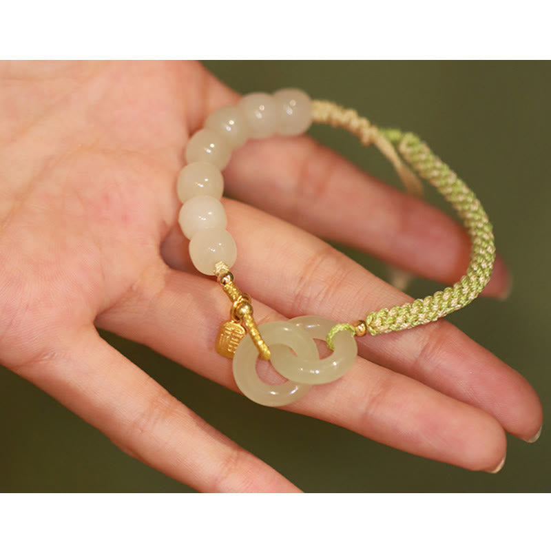 Bracelet tressé en perles de jade Hetian naturelles de Buddha Stones avec boucle de paix double et caractère Fu