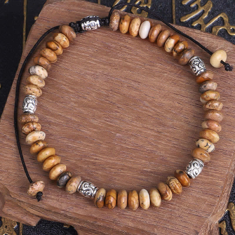 Bracelet en fil de perles positives en jaspe photo
