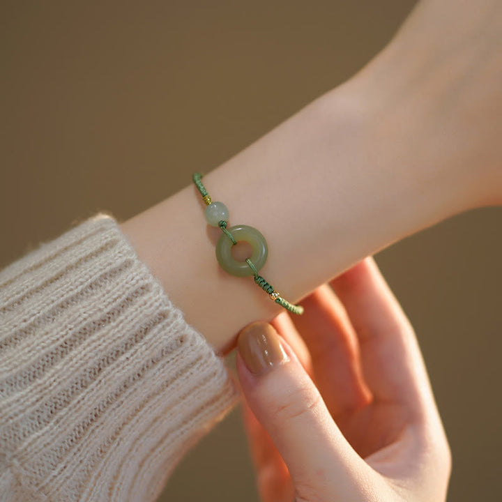 Bracelet en corde avec perles porte-bonheur et breloque en jade et Buddha Stones
