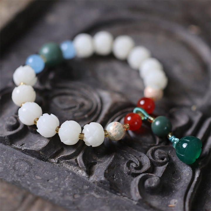 Bracelet de paix et d'harmonie sculpté en perles de lotus et graines de Bodhi en Buddha Stones