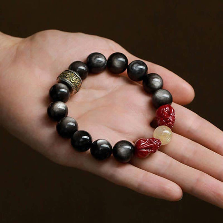 Bracelet de protection en Buddha Stones dorée et brillante PiXiu Cinabre Om Mani Padme Hum