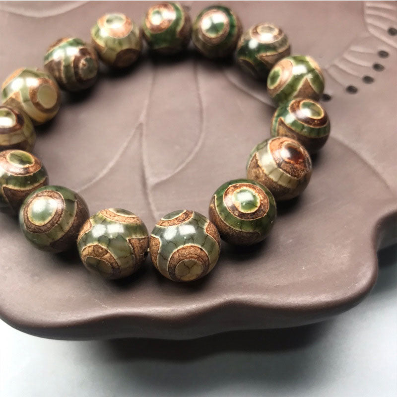 Bracelet porte-bonheur en perles dzi à trois yeux en sardonyx avec Buddha Stones